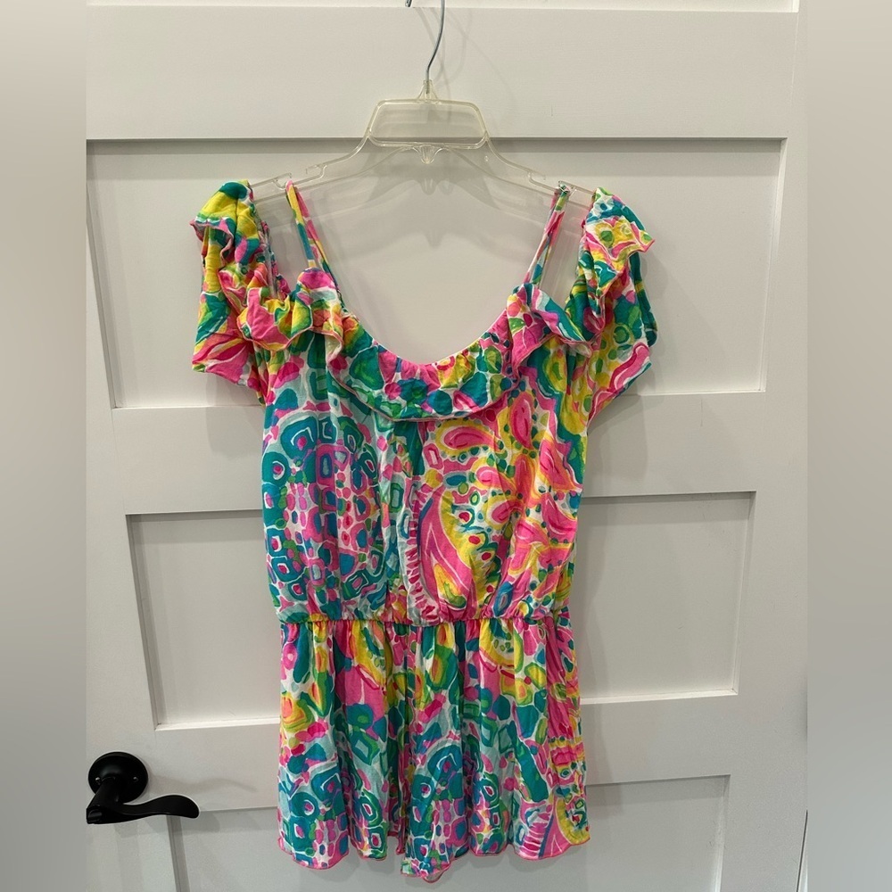 Lilly Pulitzer Vibrant Pink and Green romper.